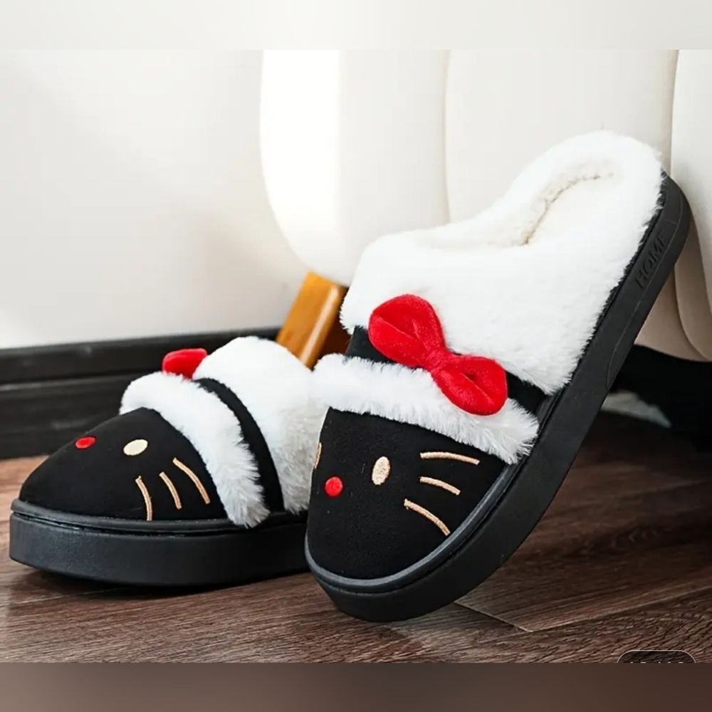 Cozy Black and White Cat Slippers with Red Bow